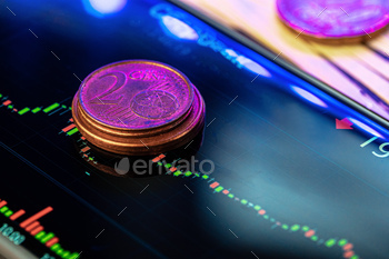 Euro coin on stock chart. Financial investment concept