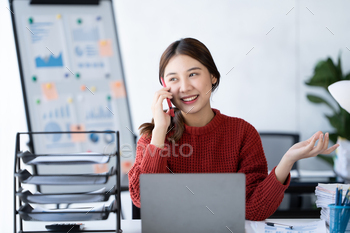Women, businessmen use computers, women work at the office. Women talk about business matters. stock photo NULLED