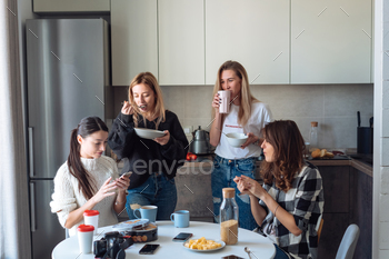 group of women in the kitchen stock photo NULLED
