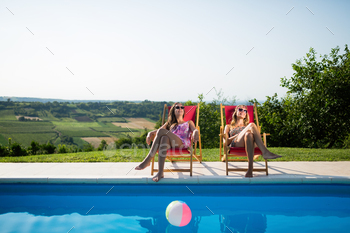 Women relaxing and sunbathing