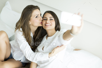 Women taking selfie