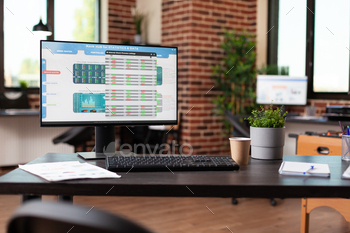 Analysis of stock market exchange on computer in business office stock photo NULLED