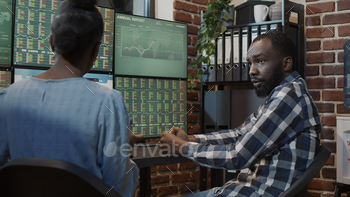 Business team analyzing stock makert trade statistics stock photo NULLED