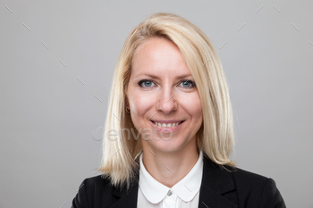 Headshot of young and happy business woman stock photo NULLED