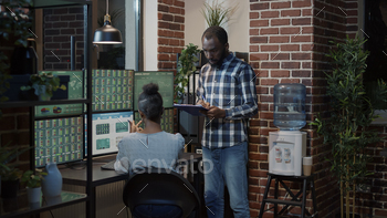 Man and woman doing teamwork on stock market investment stock photo NULLED
