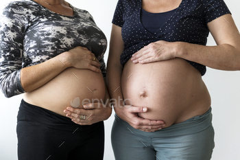 Pregnant women showing their bumps