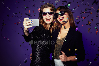 Selfie of women at party