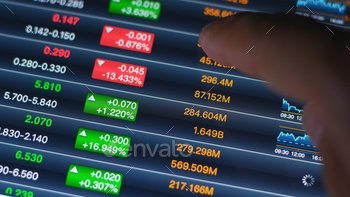 Stock market showing financial data on tablet computer stock photo NULLED