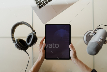 Woman recording a podcast stock photo NULLED