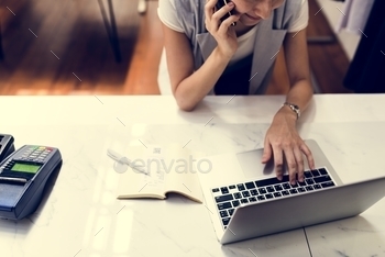 Woman working on projects stock photo NULLED