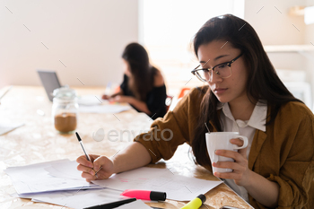 Women working with files stock photo NULLED