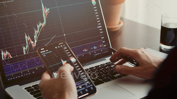trader analyzing stock trading graph phone app. stock photo NULLED